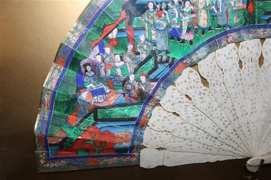 A Chinese export ivory and applique work paper leaf fan, c.1860, length 27.5cm, perspex case